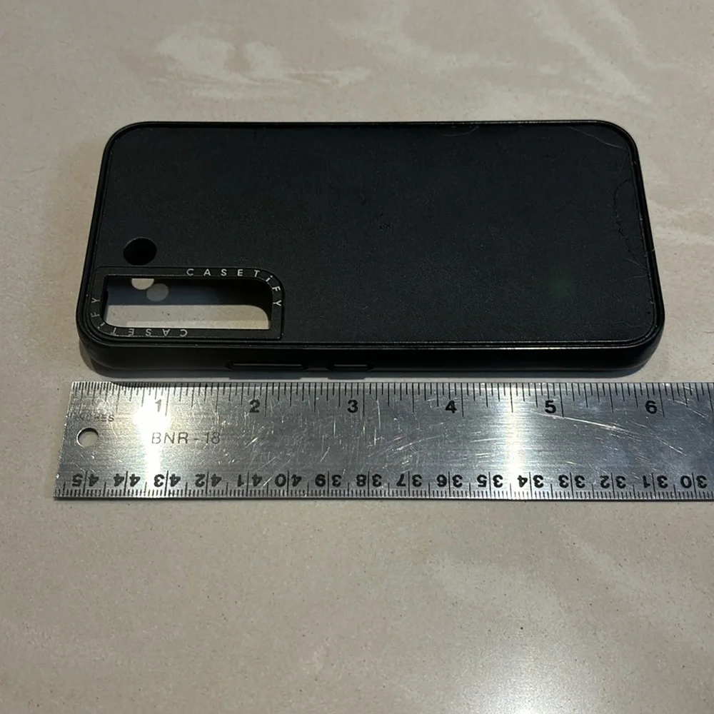 Two Samsung S22 Cases Casetify and Otterbox Black in color